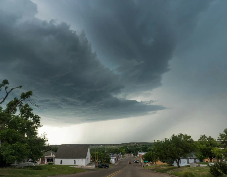 an ominous cloudy sky above a small town