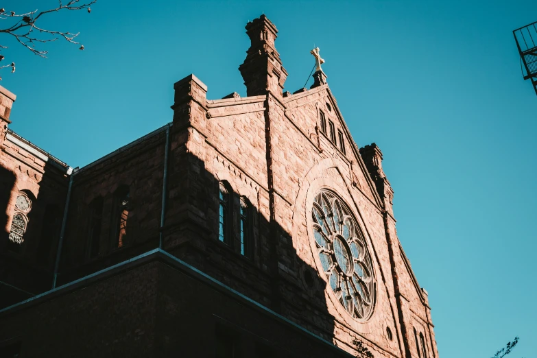 the building has a clock on the tower