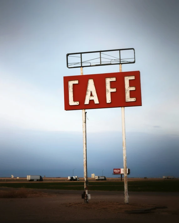 a big sign on the side of a road