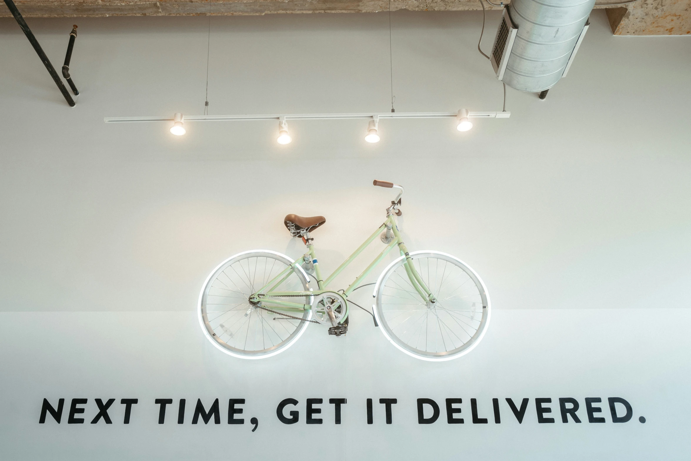 bicycle mounted on a wall in a business