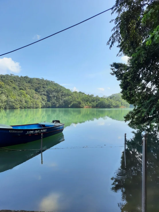 a boat that is on the water at some kind of dock