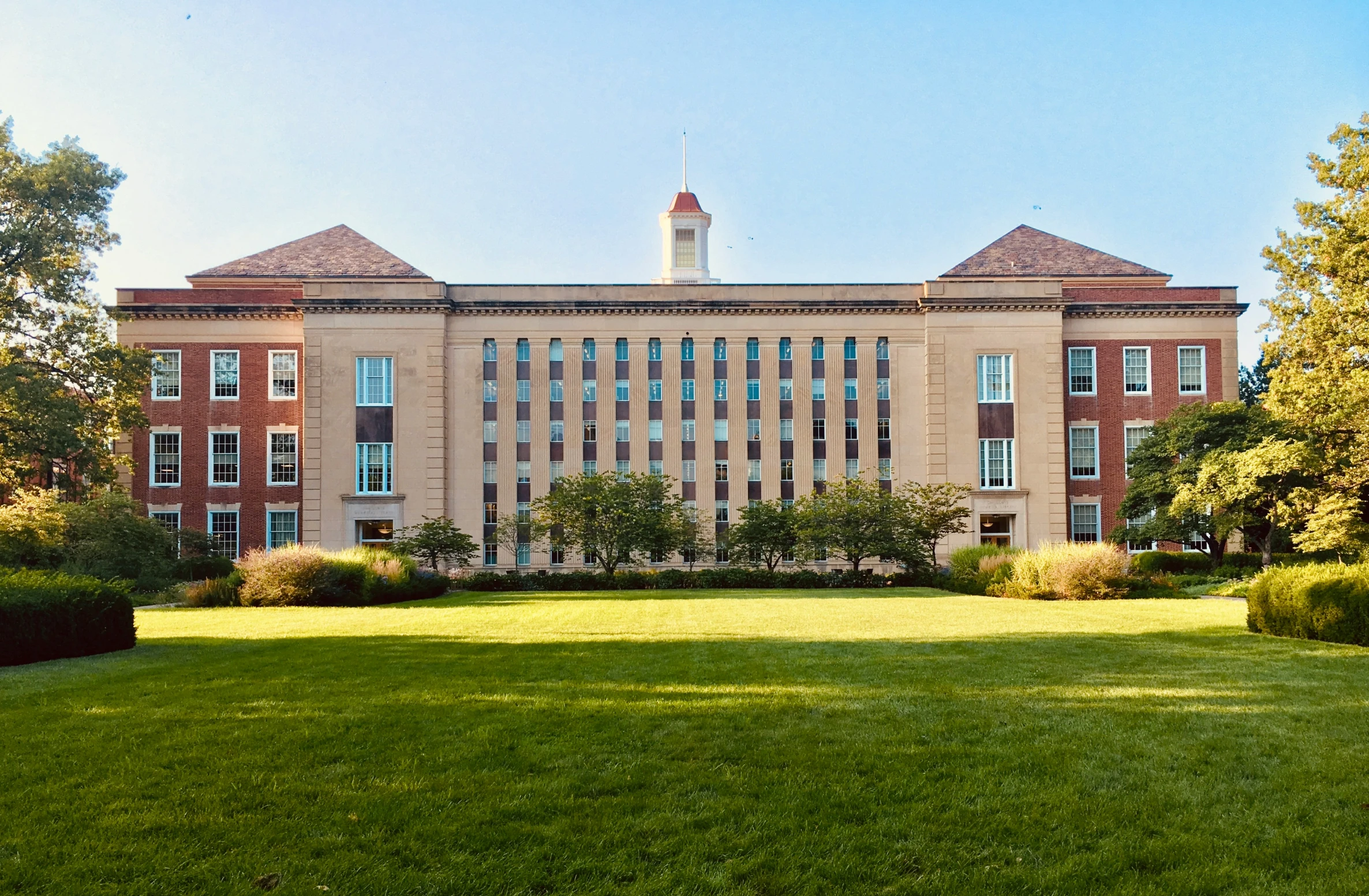 the building is located in a large grassy area