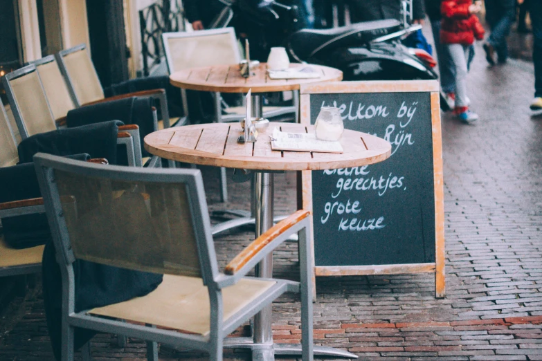 tables and chairs set up outside of restaurant