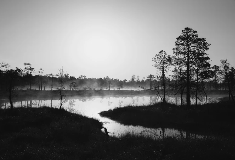 black and white pograph of a river in the distance