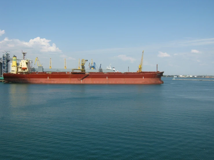 a large cargo ship sitting in the ocean