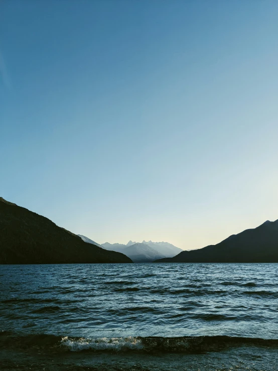 a scenic po of mountains and the ocean