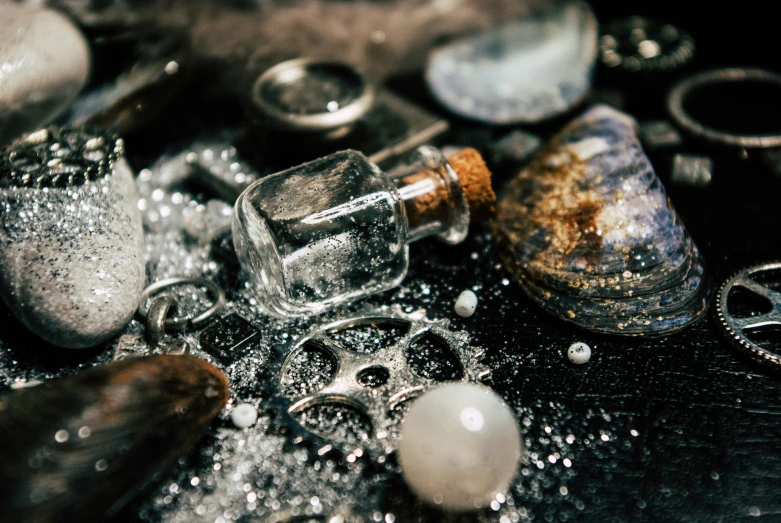 a table covered in some old fashioned silver stuff