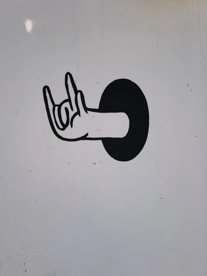 a sticker with a person's hand holding an apple in the middle of a circle