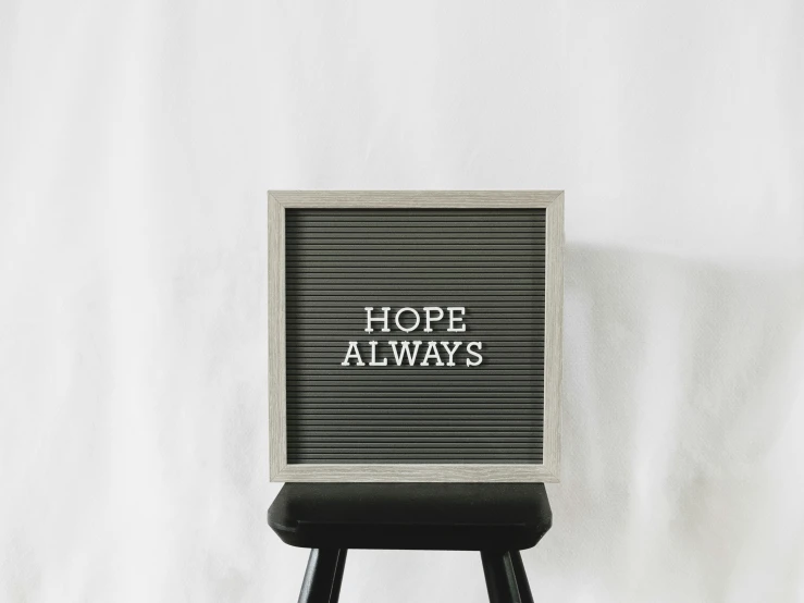 an advertit featuring hope always on a white background