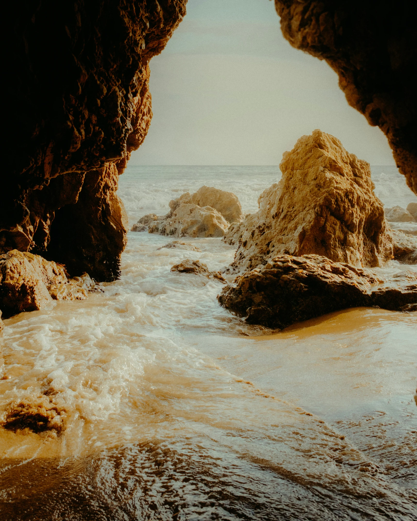 water and rock on the beach with no one