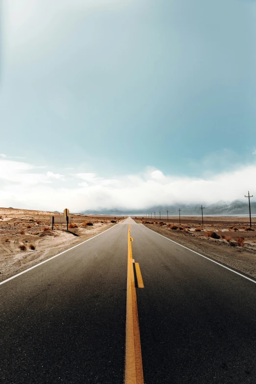 an empty highway stretches into the distance