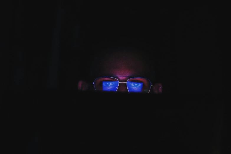 dark room with pair of sunglasses in it