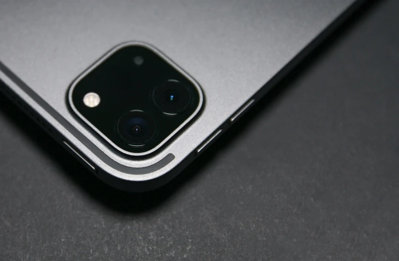 close up of the back of an iphone with a camera on it