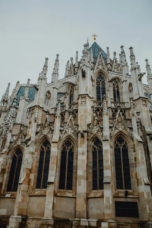 an architectural style building that has stone work on the outside