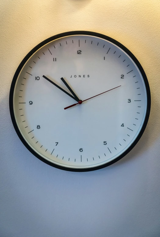 a clock hanging on the wall in a room