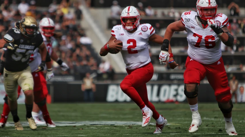 two men running in opposite direction with each other