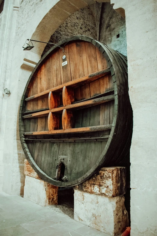 there are several wooden pieces of wine on the shelf