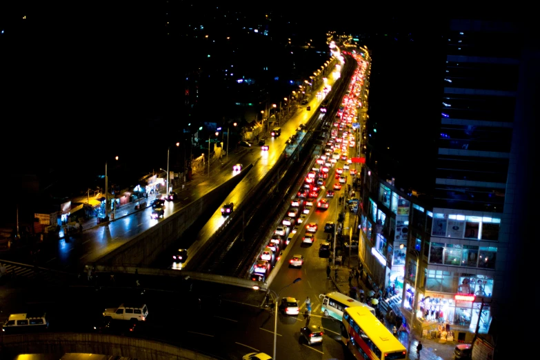 a city highway with all its lights on during night