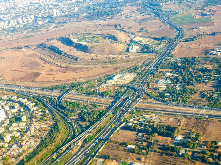 aerial view of an overpass spanning the middle of a city