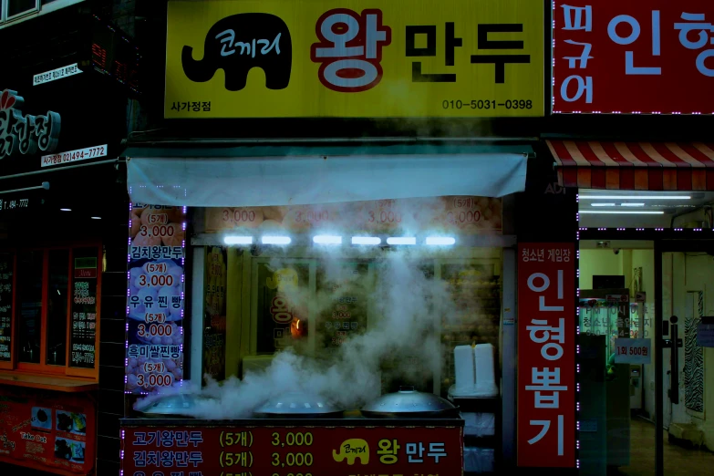 a small oriental restaurant with a big lot of smoke