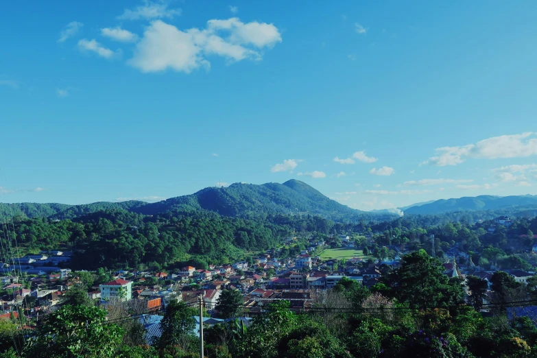 a landscape view over looking the mountains and a village