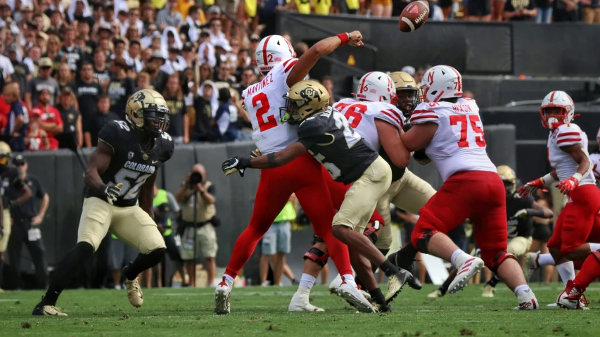 the university of washington football team playing a game of football