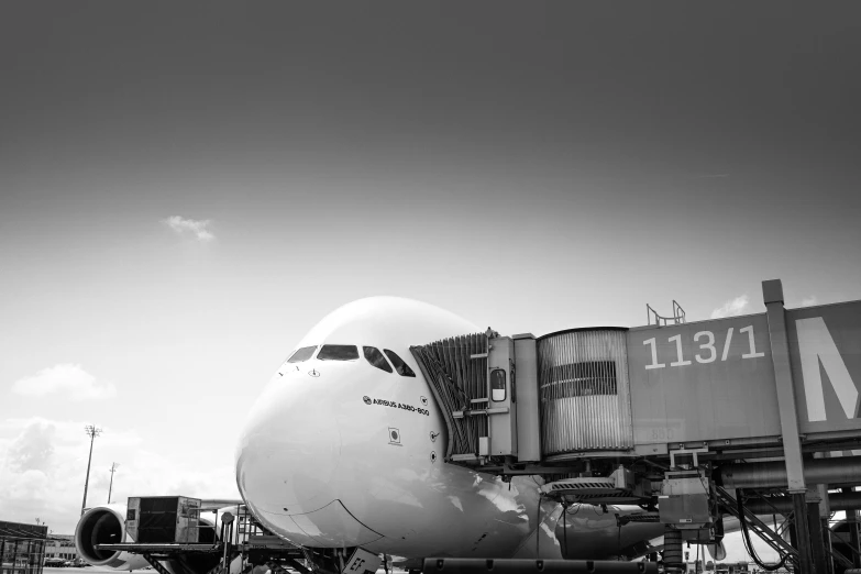 airplane is loading passengers at the airport