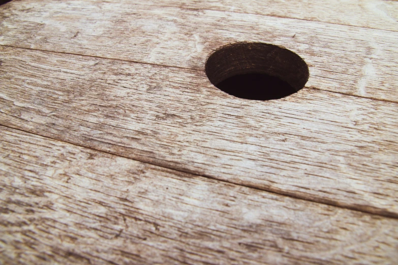 an opening in the side of a wooden surface