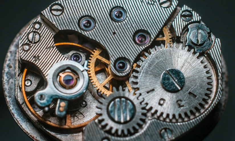 the face of an old watch mechanism