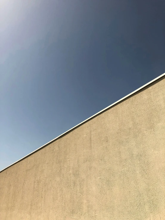 a skate boarder in mid air off of a ramp