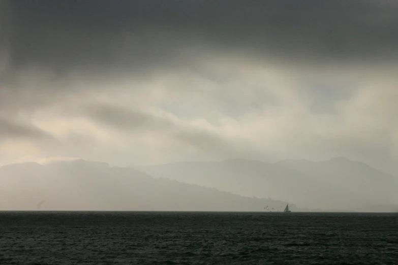 the sailboat is out on the open ocean