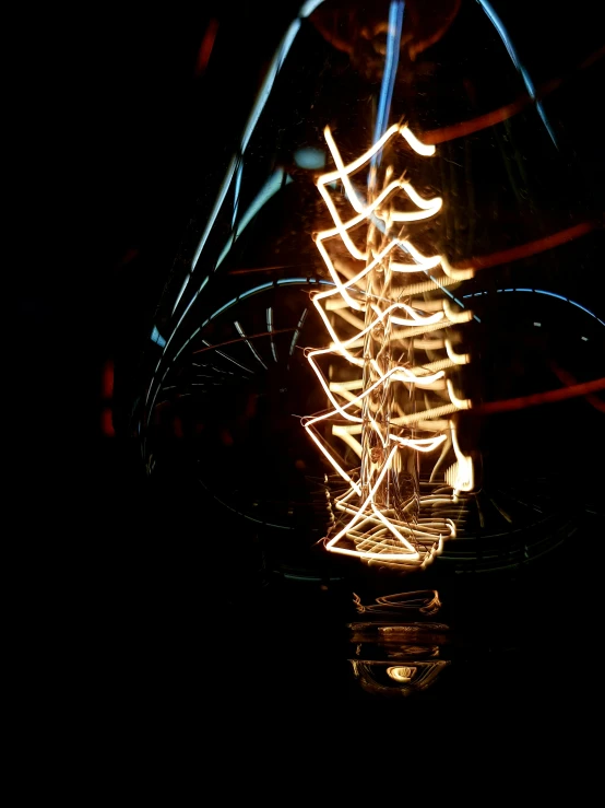 light in a glass bottle on a table