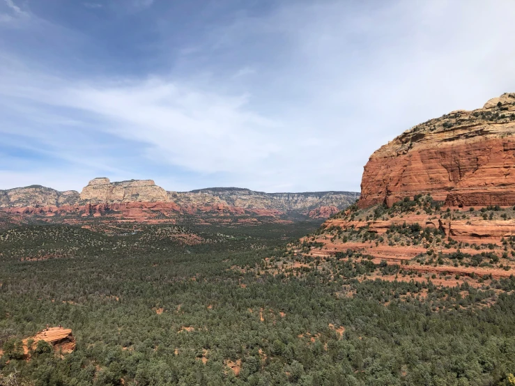 the beautiful landscape and mountain is shown under blue skies