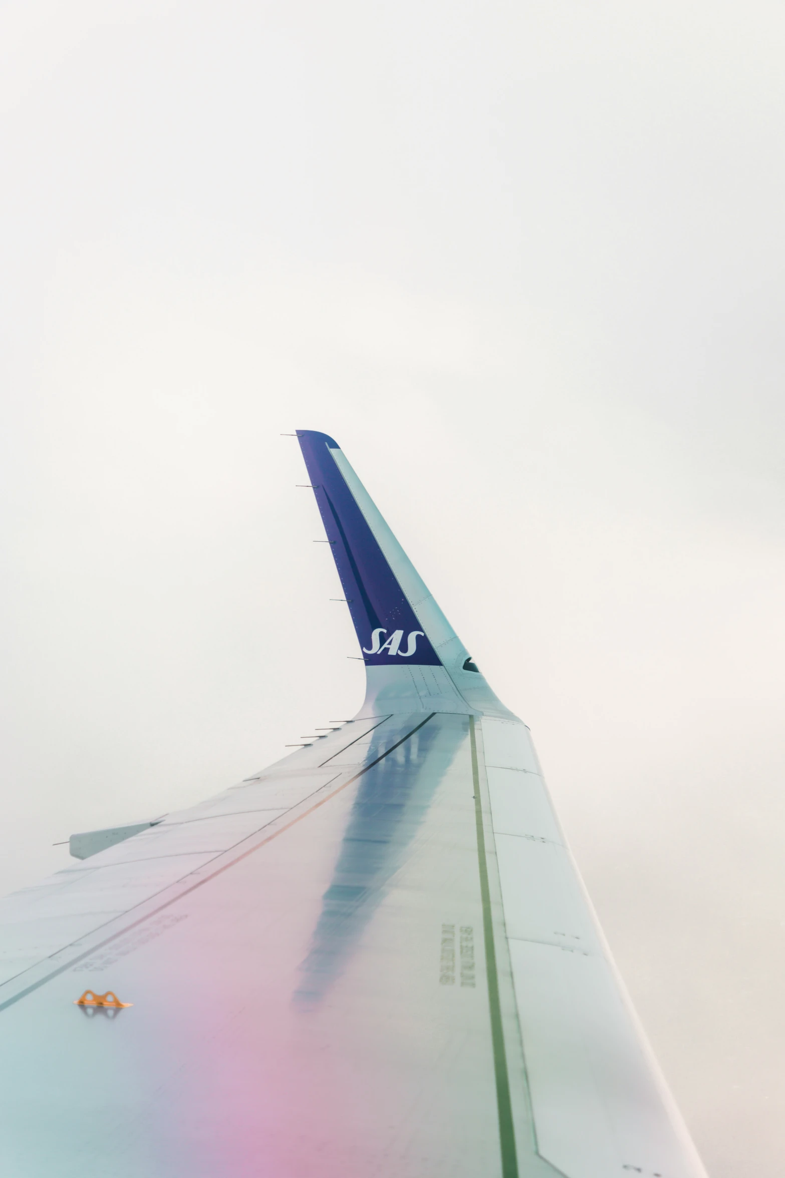 a po taken from inside of an airplane looking out the window