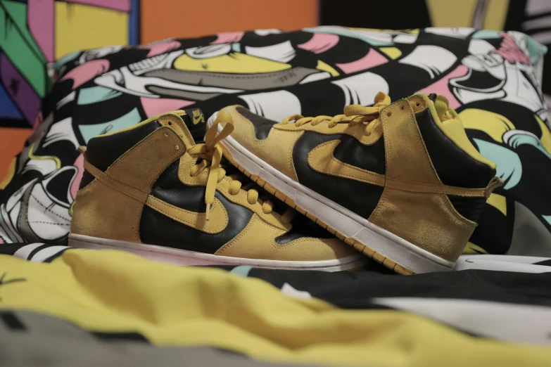 a pair of nike sneakers is shown on a couch