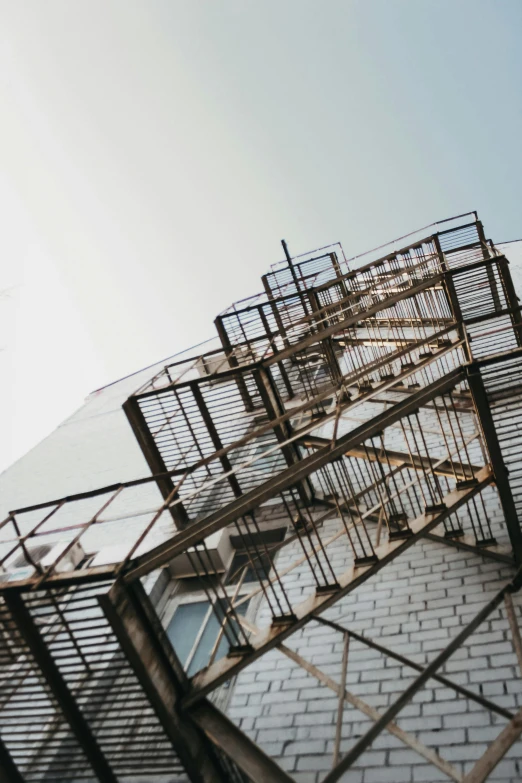 the top of a building with scaffoldings attached to it