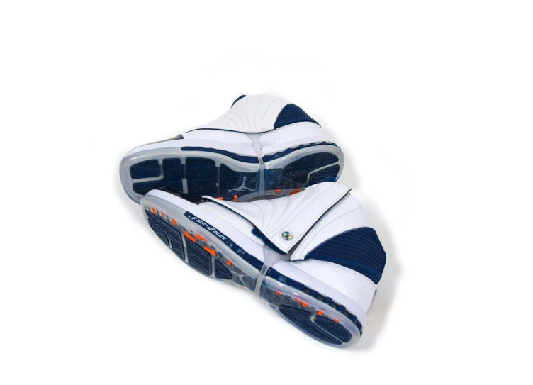 white and blue tennis shoe with an orange stripe