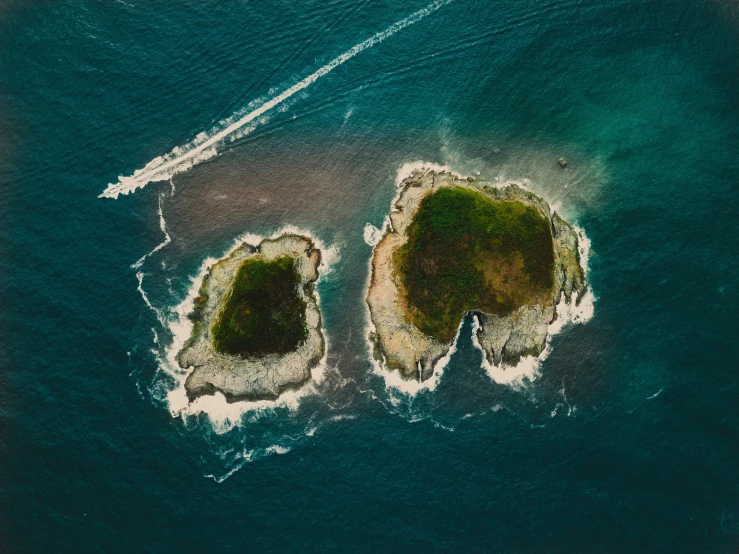 an aerial view of an island in the ocean