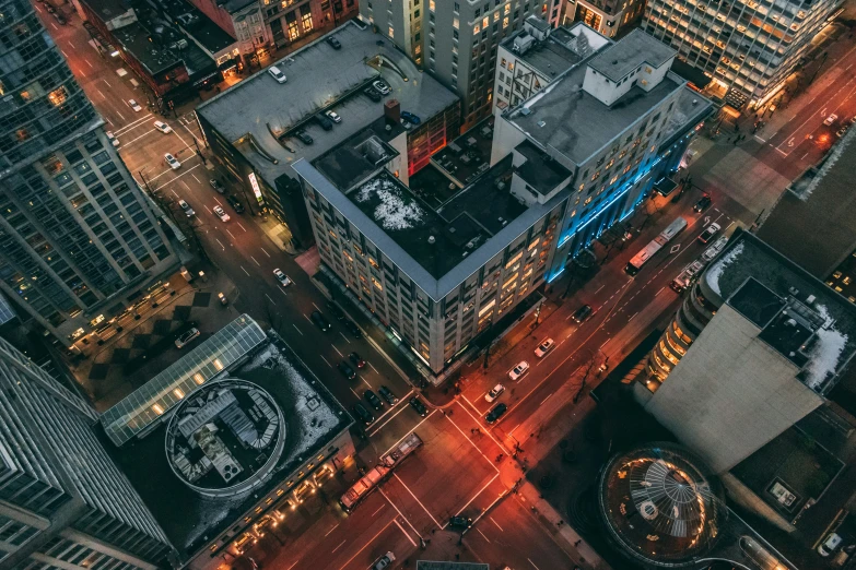 an aerial s of city buildings and roads