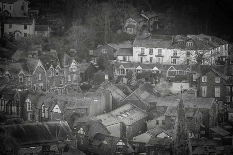 black and white po of city roofs