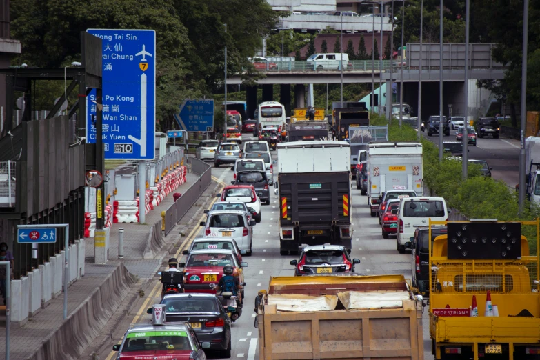 a long line of vehicles are on the freeway