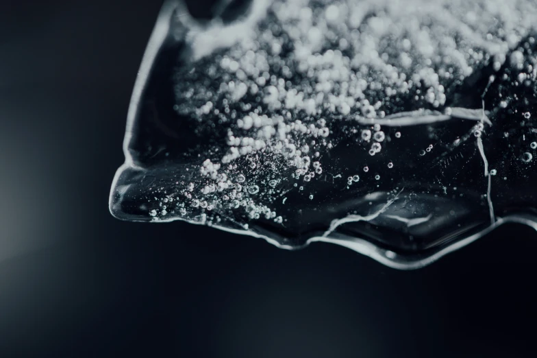 a close up po of sugar on top of water