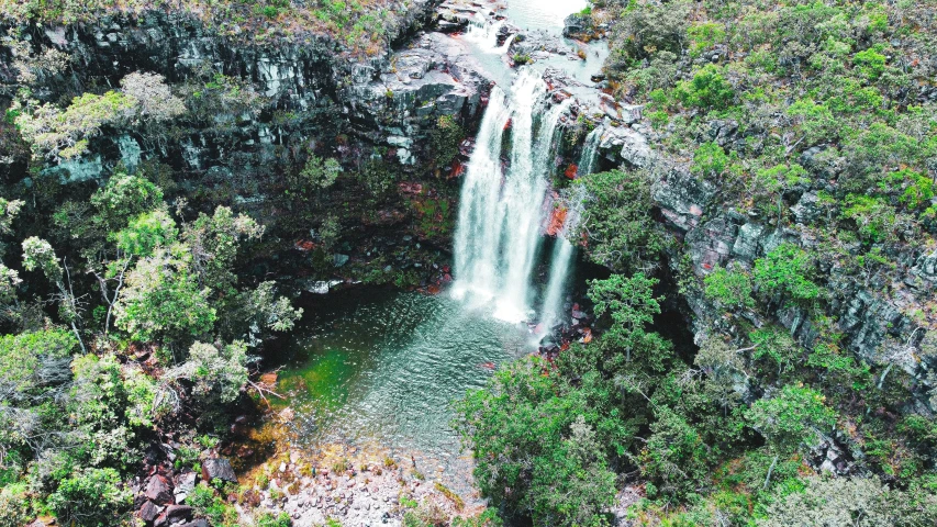 water tumbling down a waterfall in the forest