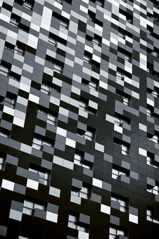 an abstract pattern of smaller squares in greyscape
