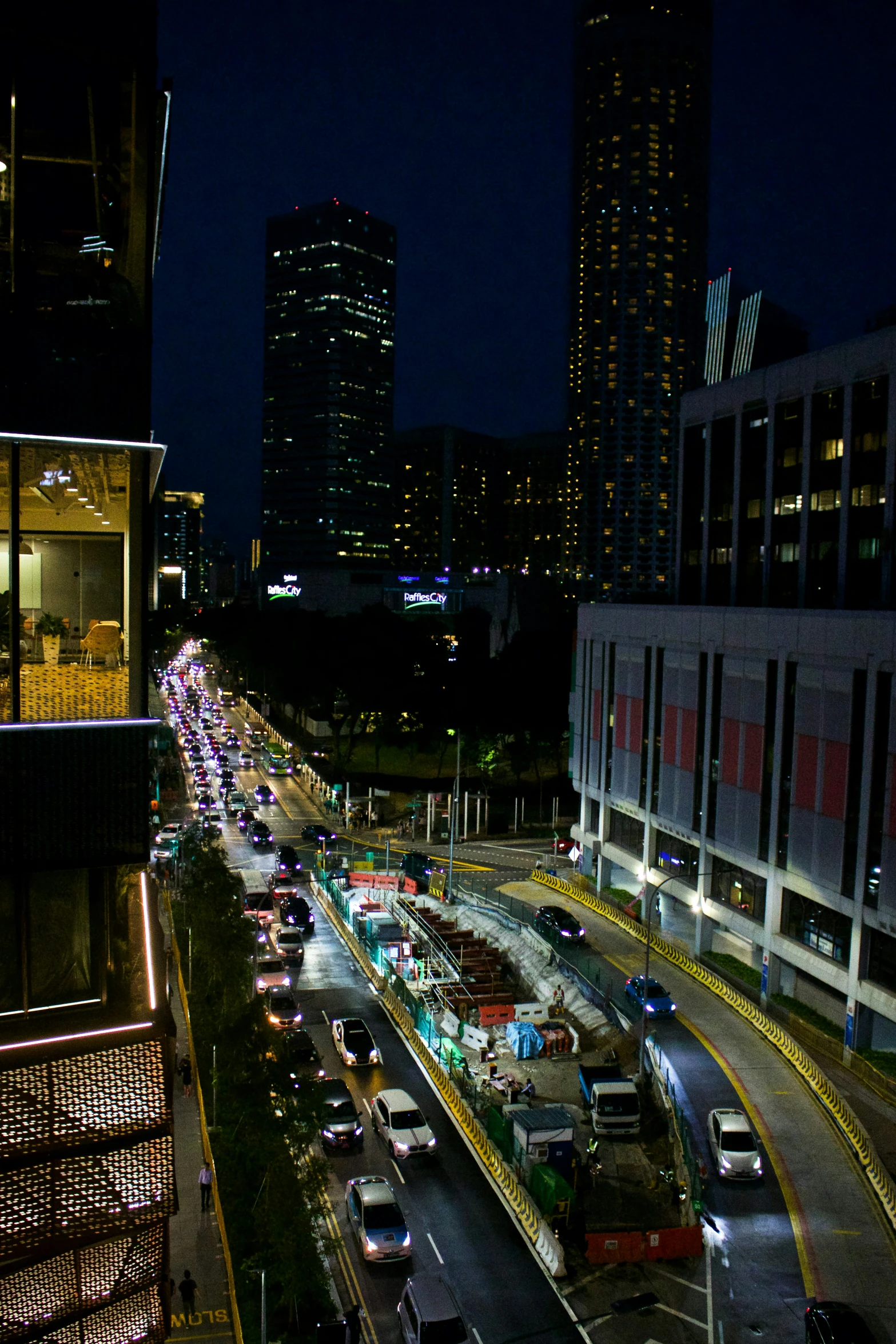 traffic in downtown at night and on both sides of road