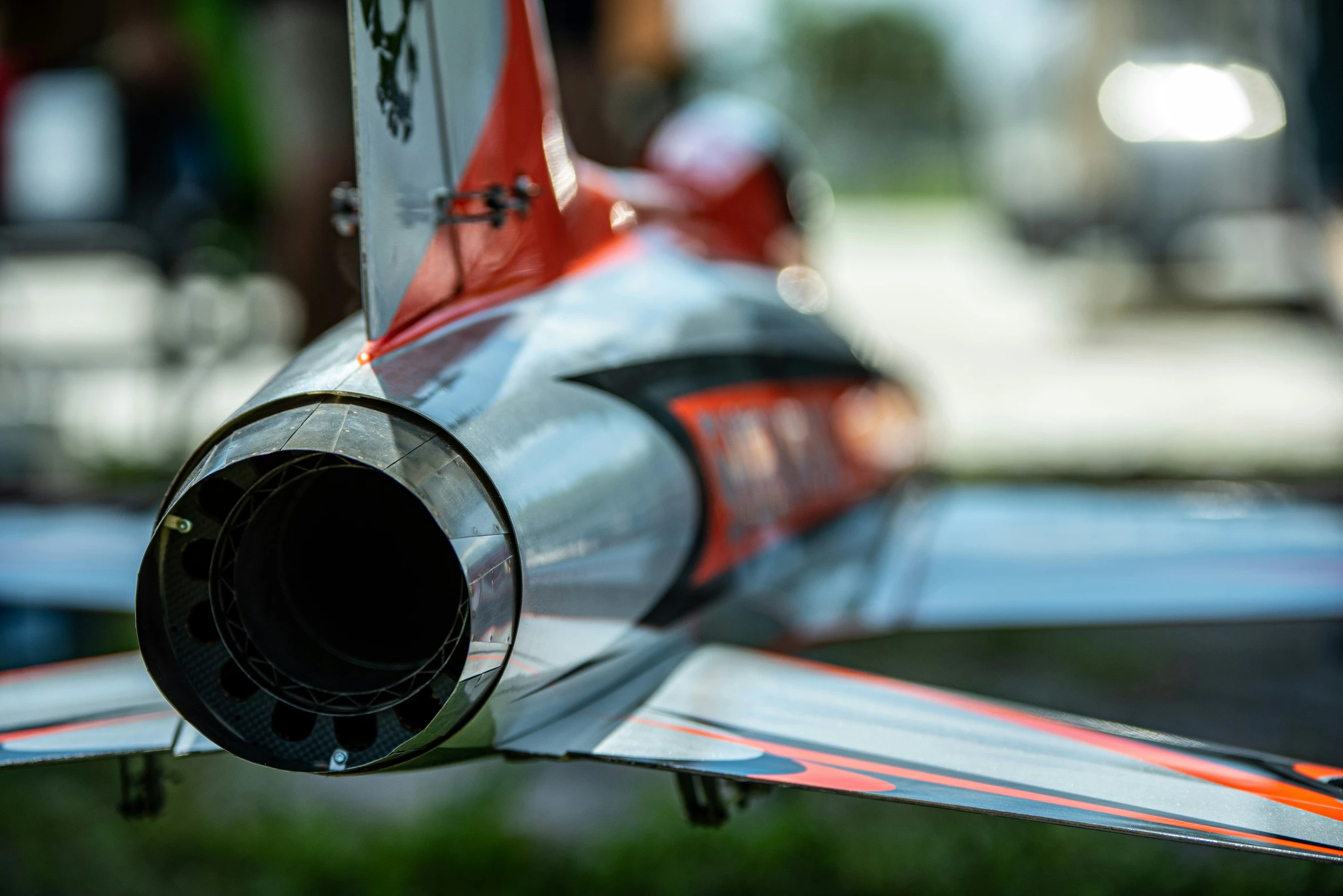 a close - up of a toy airplane in the grass