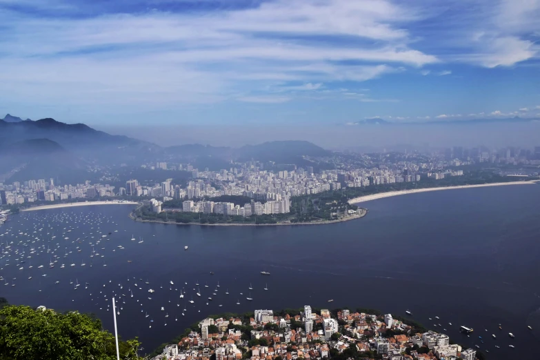 a city that is next to a lake with boats