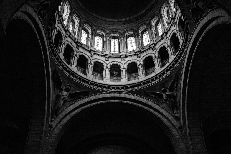 the inside view of a cathedral at night