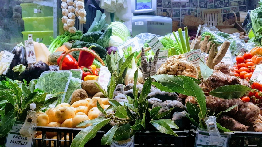 a market scene with focus on fruits and vegetables