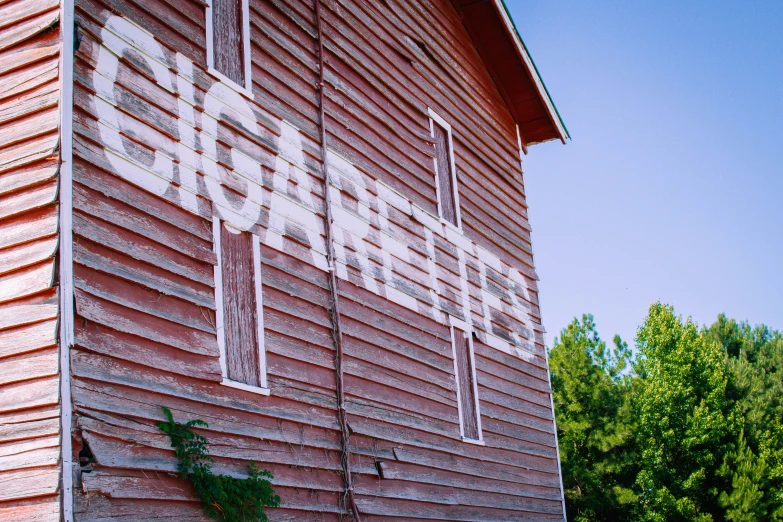 a po of a sign on the side of a house